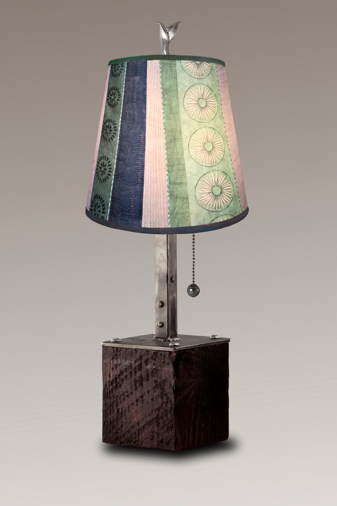 Steel Table Lamp on Reclaimed Wood with Small Drum Shade in Serape Waters