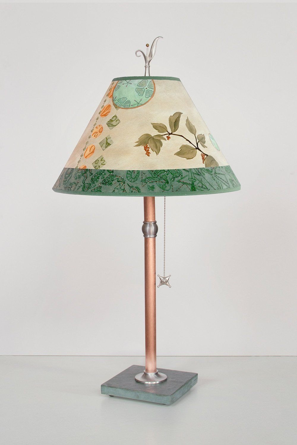 Celestial Leaf medium conical copper table lamp lit